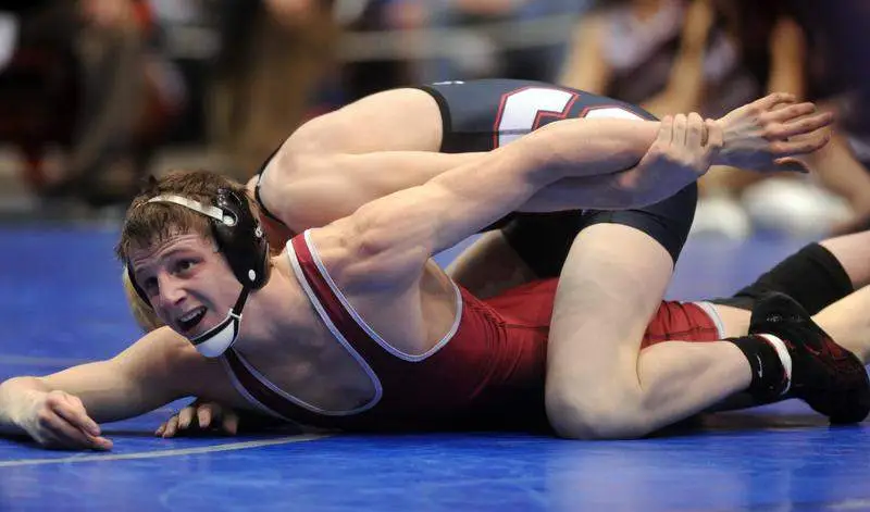 Shoot Wrestling, one athlete holds a reception to another athlete